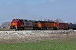 BNSF 4717 leads a Oil can Sb.